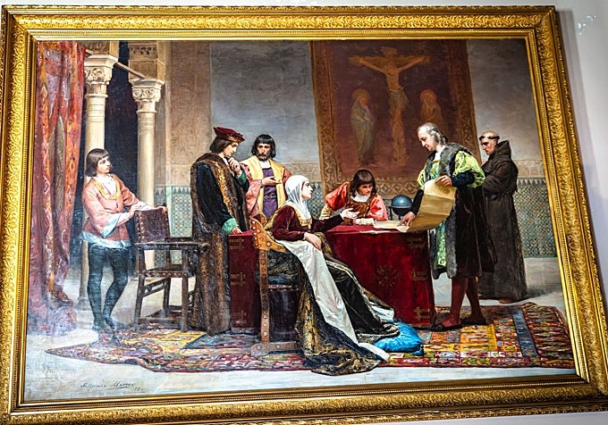 De izquierda a derecha, Diego Colón, Fernando El Católico, Luis de Santángel, Isabel la Católica, el príncipe Juan, Cristóbal Colón y el cardenal Cisneros.