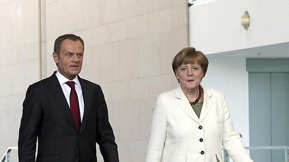 La canciller alemana, Angela Merkel, y el primer ministro polaco, Donald Tusk. 