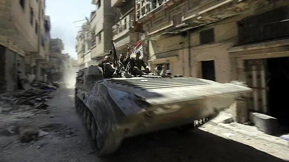 Soldados sirios, de patrulla en Alepo 