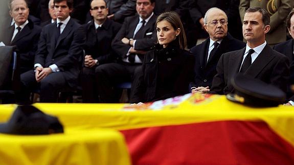 Los Reyes, durante el funeral.