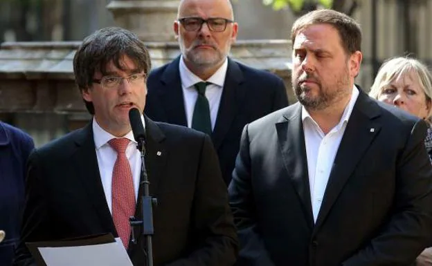 Puigdemont y Junqueras. 