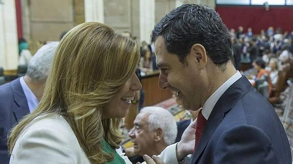 La presidenta de la Junta de Andalucía en funciones, Susana Díaz, y el líder del PP-A, Juanma Moreno 