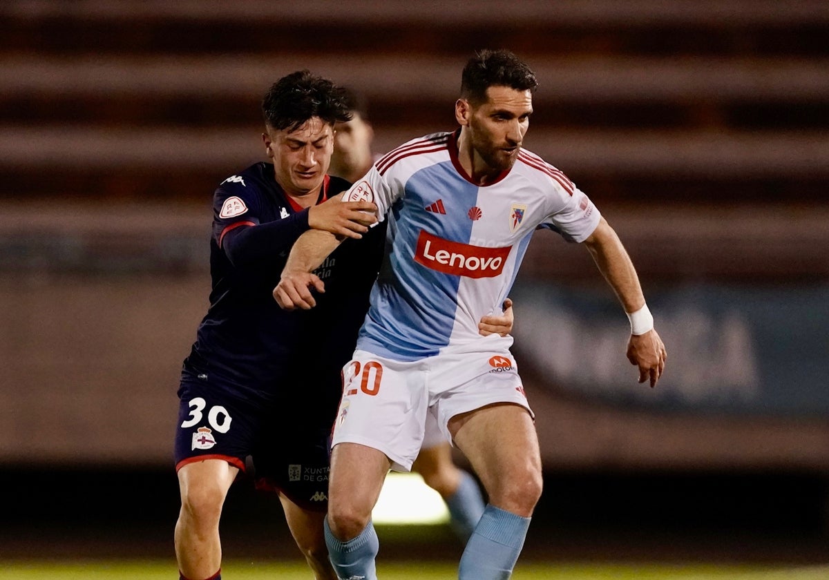 Manu Ferreiro y Tienza durante el choque aplazado entre Fabril y Compostela de este miércoles.