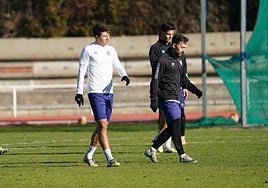 Davo, en un entrenamiento junto a Parra.