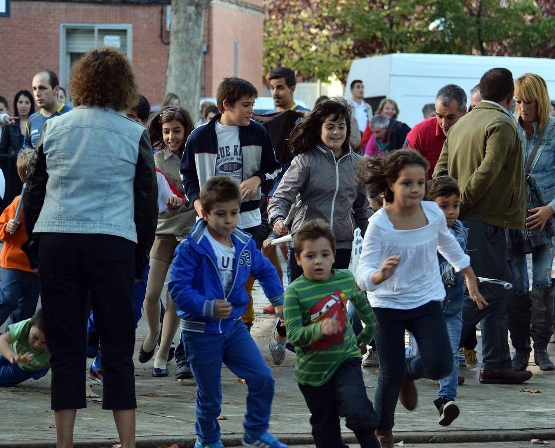 Encierro infantil con reses simuladas en las fiestas de Varea