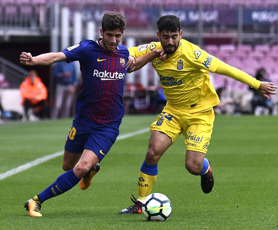 Las mejores imágenes del partido de la séptima joranda de Liga entre el Barcelona y e Las Palmas, que se ha disputado a puerta cerrada.