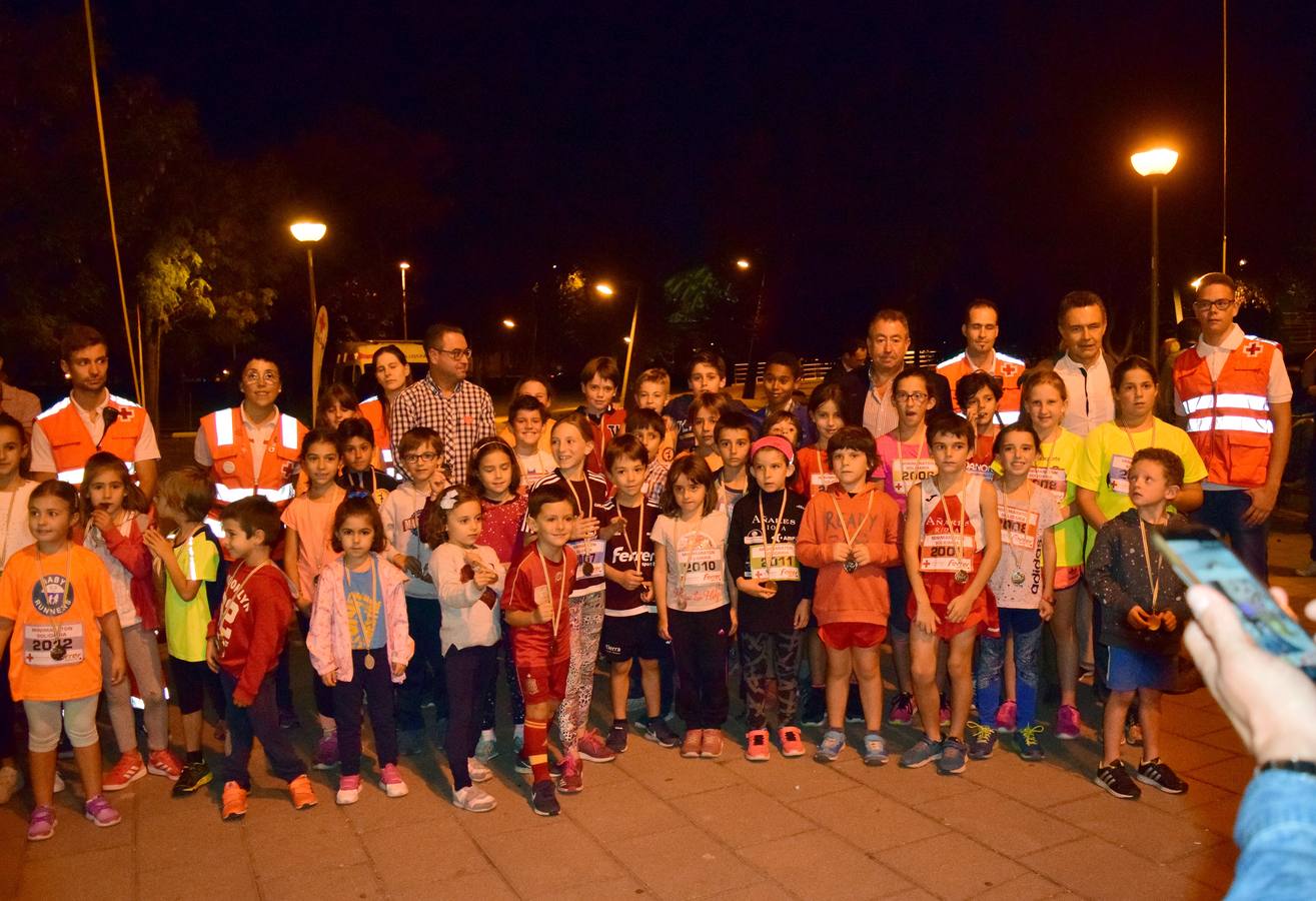 Decenas de niños participaron en el minimaratón solidario, a favor de Cruz Roja.