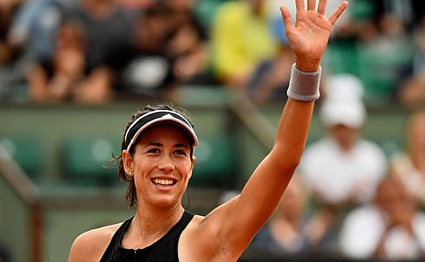 Garbiñe Muguruza celebra su victoria. 
