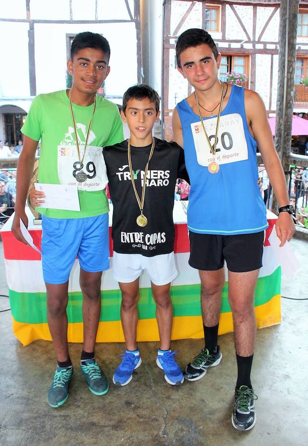 XVIII Carrera Puente a Puente 'Trofeo Violeta Villanueva' en la que han participado cientos de niños en una festiva Ezcaray. 