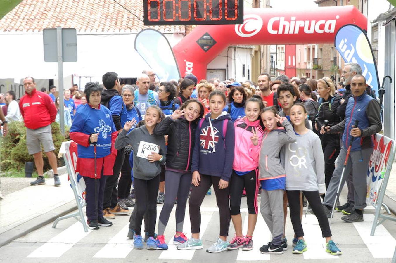 IV marcha solidaria de El Redal, en favor de AFA Rioja. En la cita han participado 370 personas y después también se han celebrado carreras sénior e infantil.