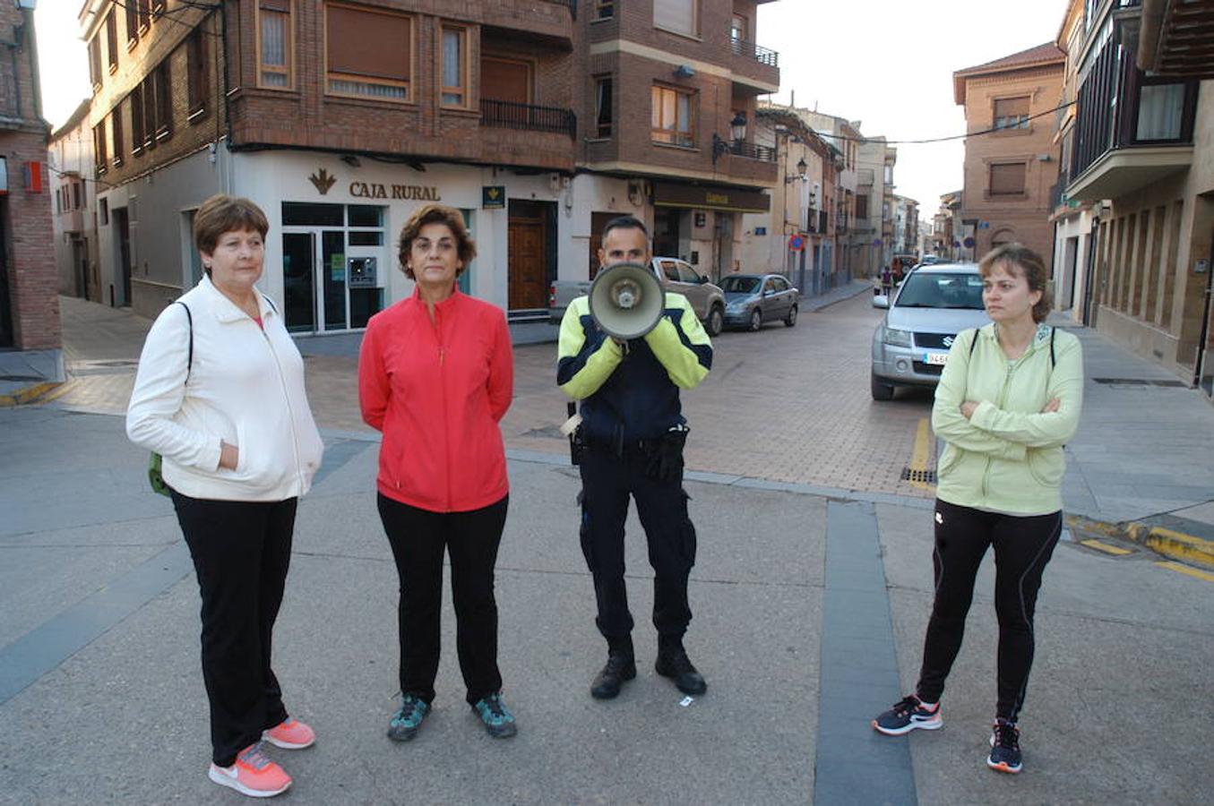 Imágenes correspondientes a la marcha para recaudar fondos contra el cáncer en Aldeanueva de Ebro.