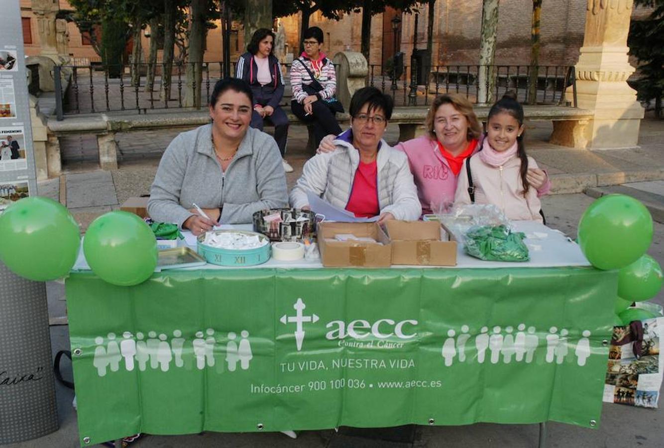 Imágenes correspondientes a la marcha para recaudar fondos contra el cáncer en Aldeanueva de Ebro.