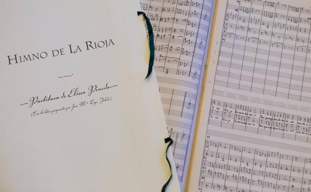 t Himno de La Rioja. Facsímil de la portada y de varias partituras del himno compuesto por Pinedo. 