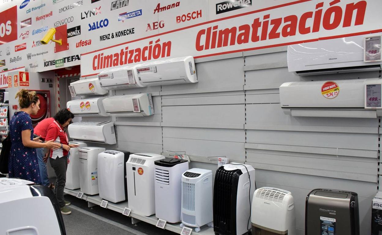 Ventiladores y muchas sandías