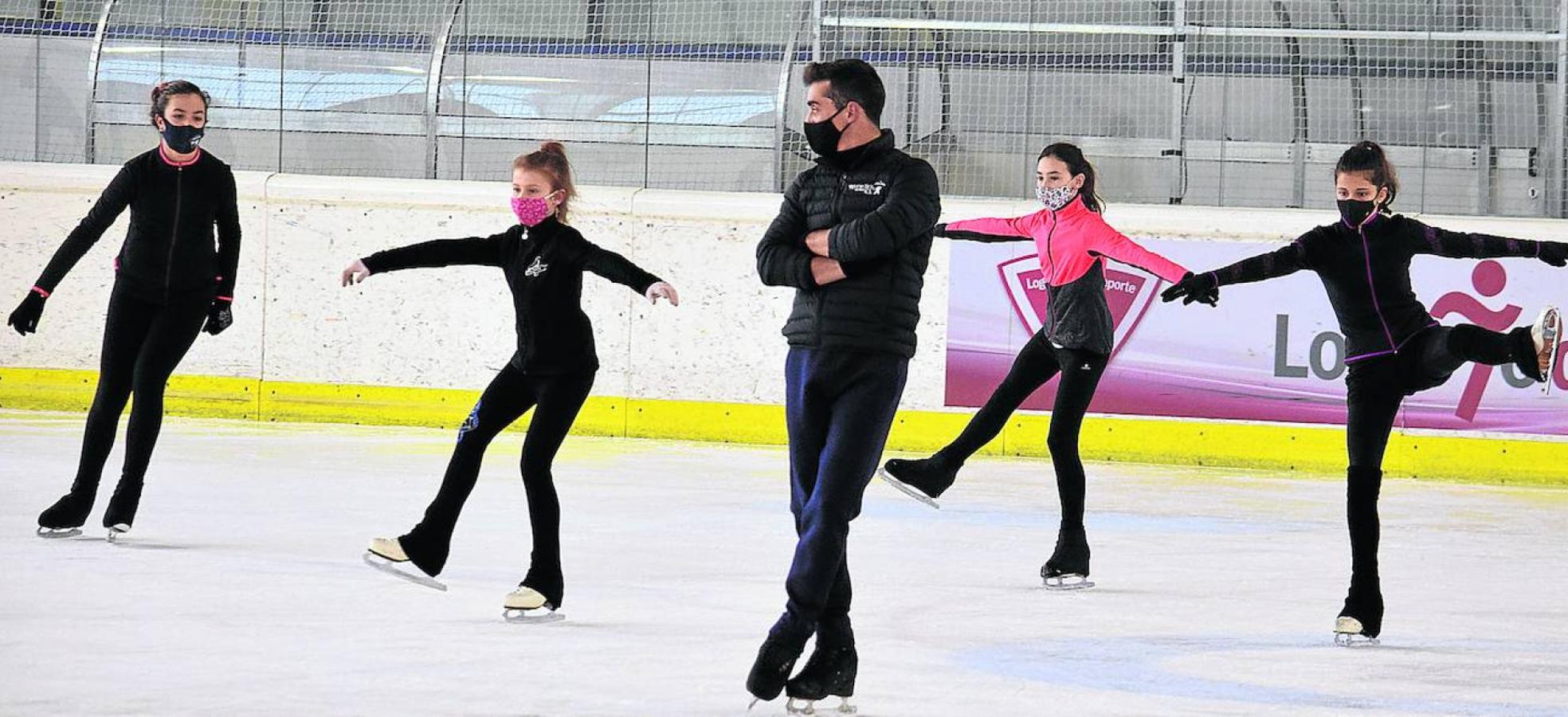 Patinar de la mano de un bicampeón