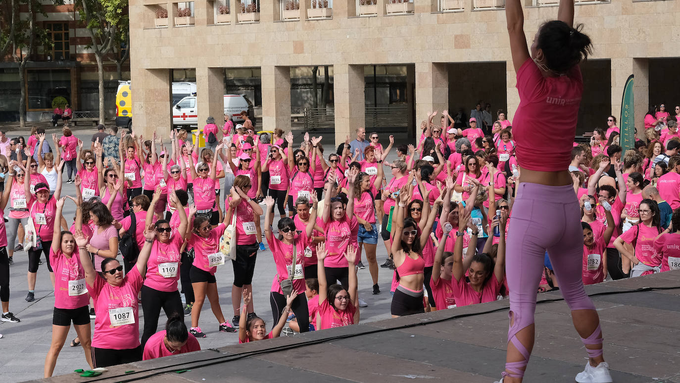 Fotos: El ambiente, los saludos y las fotos en la Carrera de la Mujer en Logroño