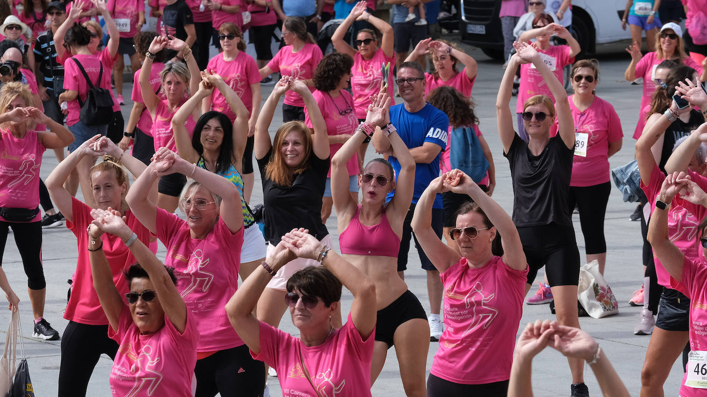 Fotos: El ambiente, los saludos y las fotos en la Carrera de la Mujer en Logroño