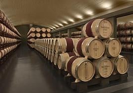 Barricas descansan en una de las salas de Bodegas Montecillo.