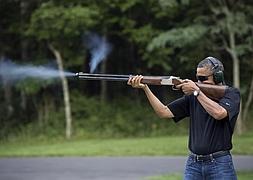 Obama dispara en agosto en Camp David. / La Casa Blanca
