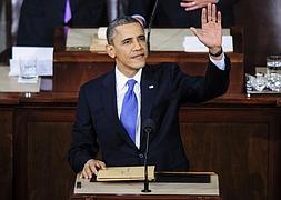 El presidente de EEUU Barack Obama, saluda a los asistentes antes de pronunciar el discurso del Estado de la Unión. / Efe