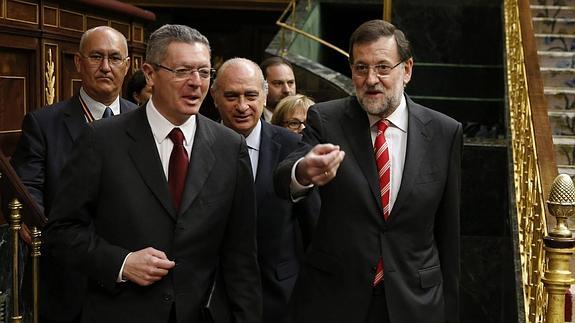 Alberto Ruiz-Gallardón y Mariano Rajoy.