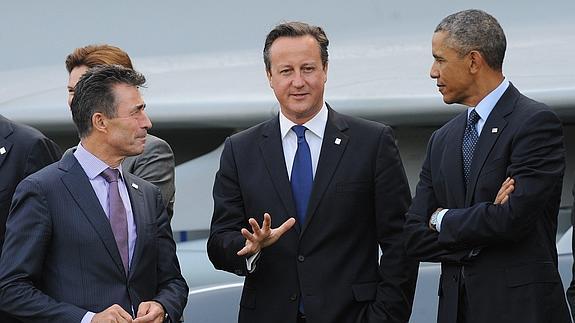 Rasmussen, Cameron y Obama. 