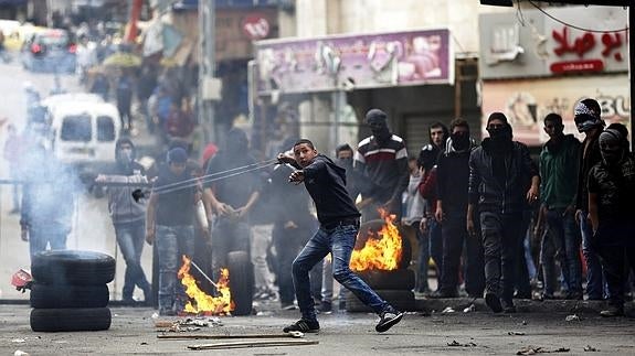 Enfrentamientos entre judíos y palestinos en Hebrón.