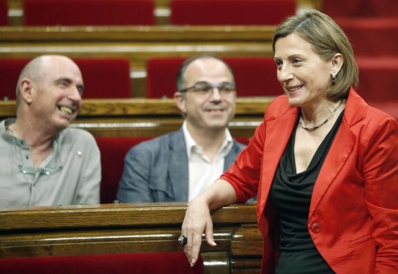 La presidenta del Parlament, Carme Forcadell, ayer, en el hemiciclo de la cámara catalana. :: a. dalmau / efe