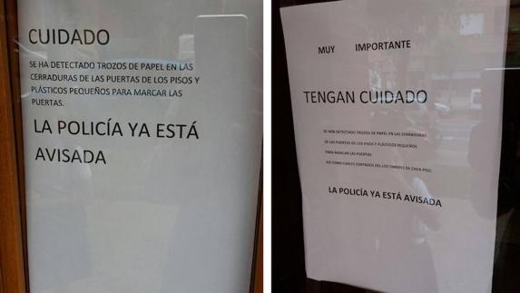 Carteles expuestos en varios portales del entorno de Cascajos. 