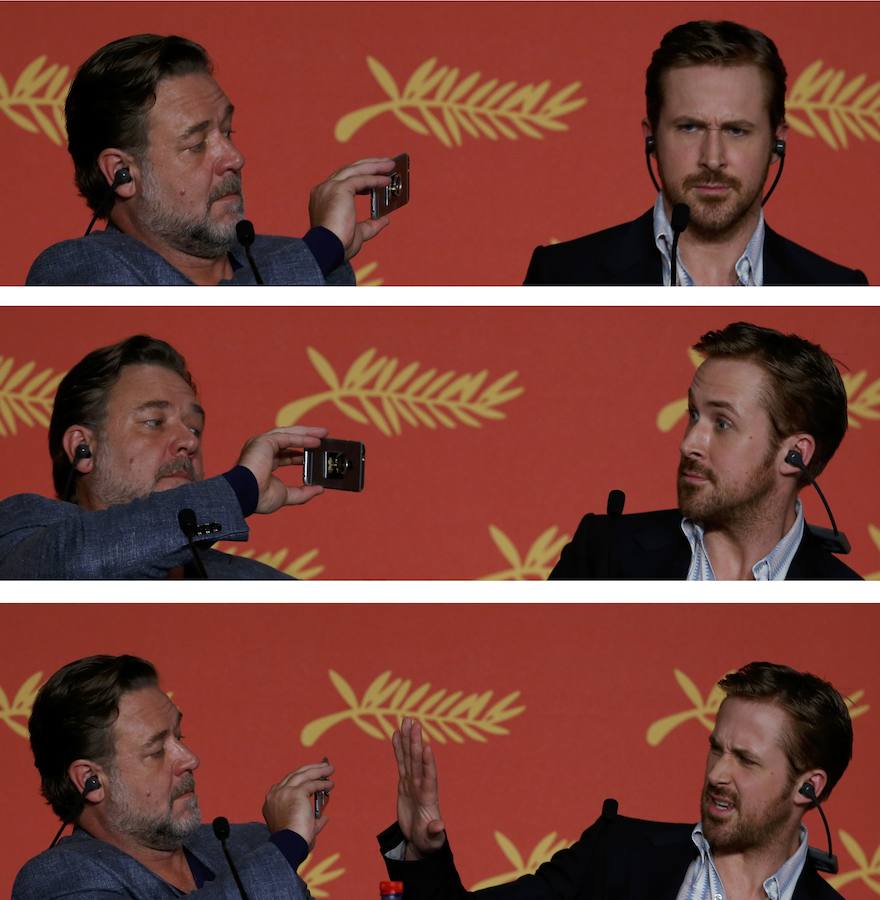 Russell Crowe (i) y Ryan Gosling (d) bromean durante la rueda de prensa de la película 'Dos buenos tipos' fuera de concurso en el 69º Festival de Cine de Cannes en Cannes , Francia , 15 de mayo