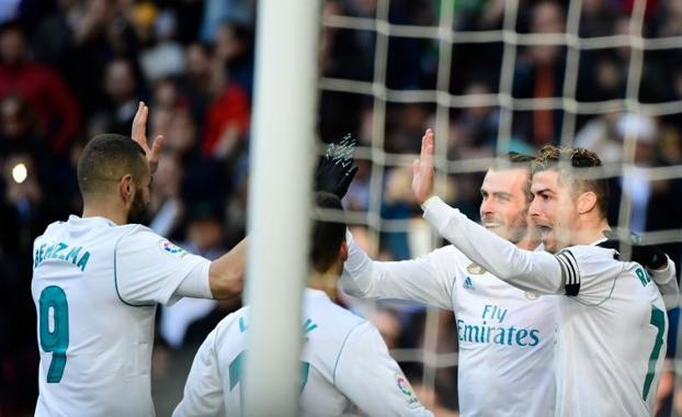 Benzema, Lucas Vázquez, Bale y Cristiano celebran uno de los goles del Real Madrid. 