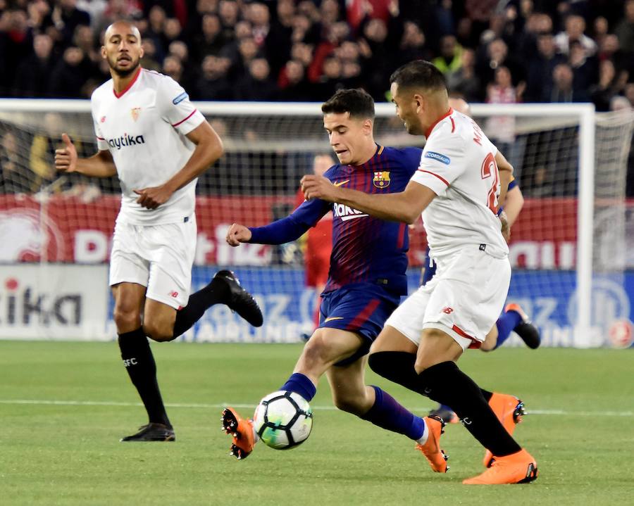 El líder salvó un punto en su visita al Sánchez Pizjuán (2-2) al neutralizar con tantos de Luis Suárez y Messi los goles de Franco Vázquez y Muriel.