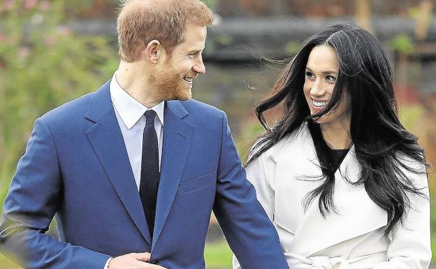 El príncipe Harry, junto a Meghan Markle. 