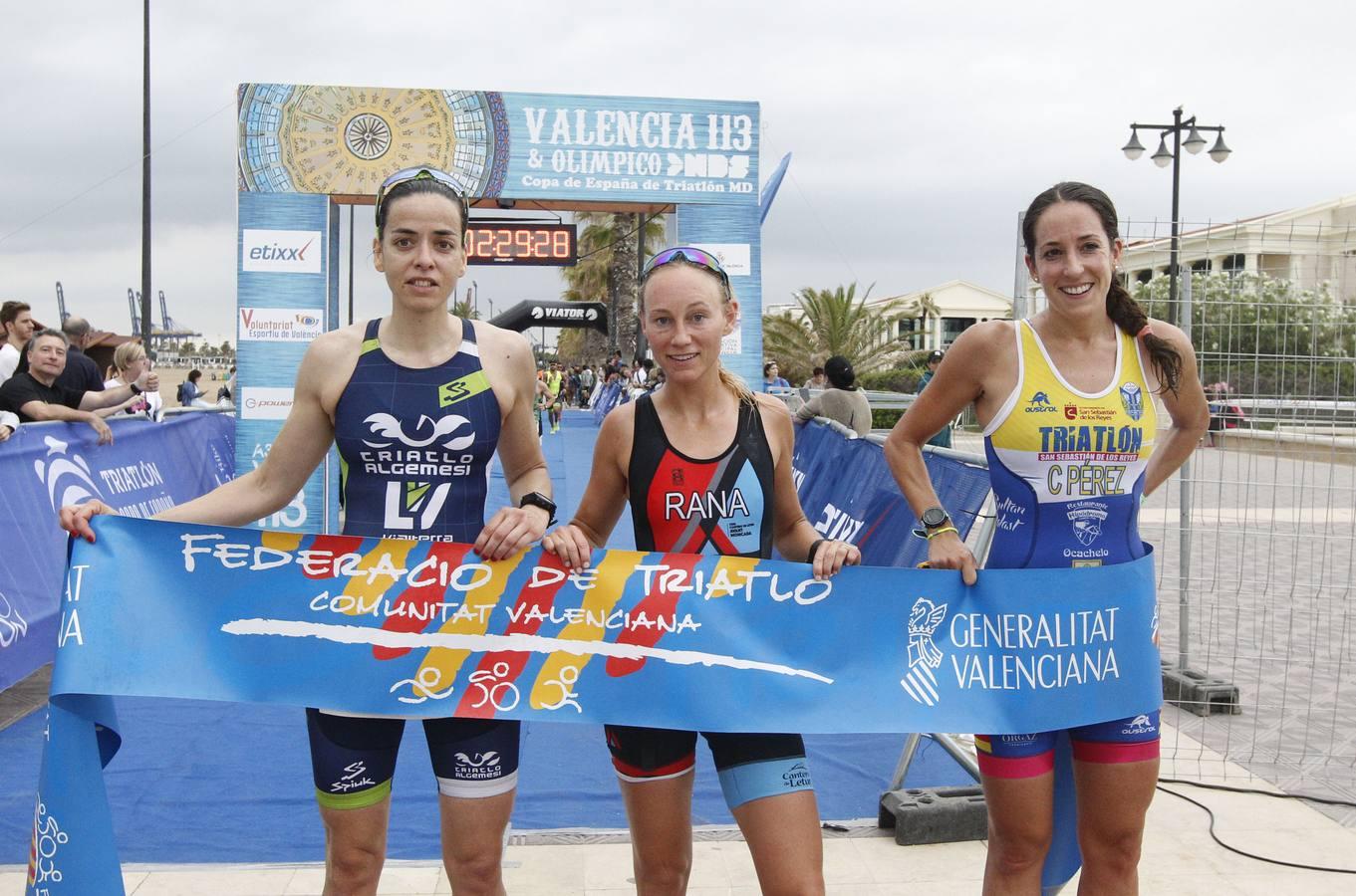 Francisco Fernández (Trampolín de Toledo) y Anna Noguera (Igualada) se llevaron el triunfo en el triatlón Media Distancia (1,9 kms de natación, 90 kms de bici y medio maratón) celebrada en la playa de Las Arenas. El campeón masculino lo hizo en 3.48.08 mientras que Noguera necesitó 4.11.39 