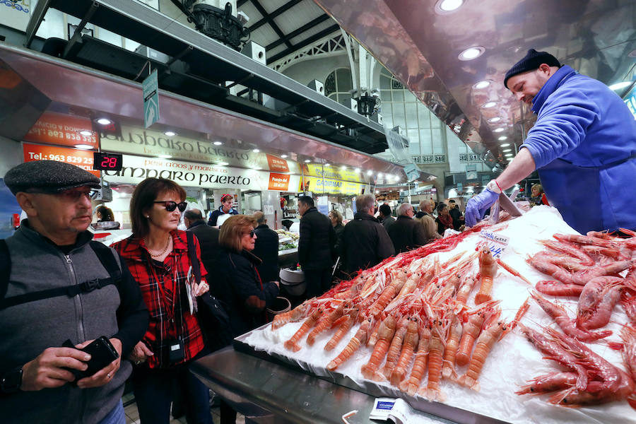 Fotos: La Navidad rescata los mercados de Valencia