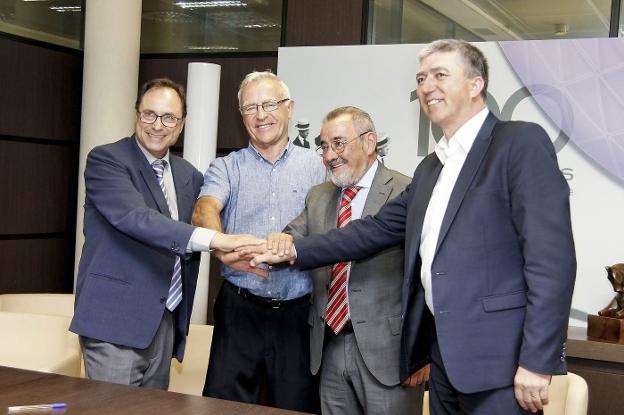 Vicent Soler, Joan Ribó, José Vicente González y Rafael Climent, tras pactar la hoja de ruta ferial. 