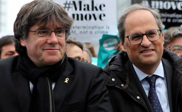 Puigdemont (i) y Torra.