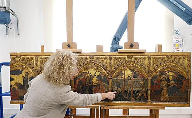 La predela del retablo del Centenar de la Ploma. 