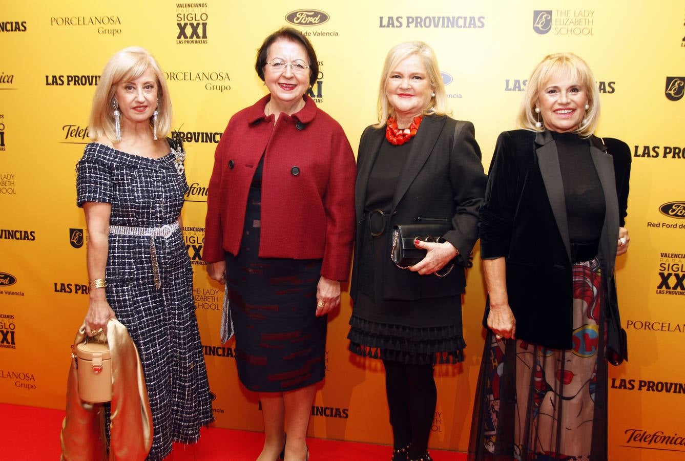 Amparo Ribera, Elvira Ferrer y Rosa Fenollar, del Rotary, con Carmen de Rosa, del Ateneo.