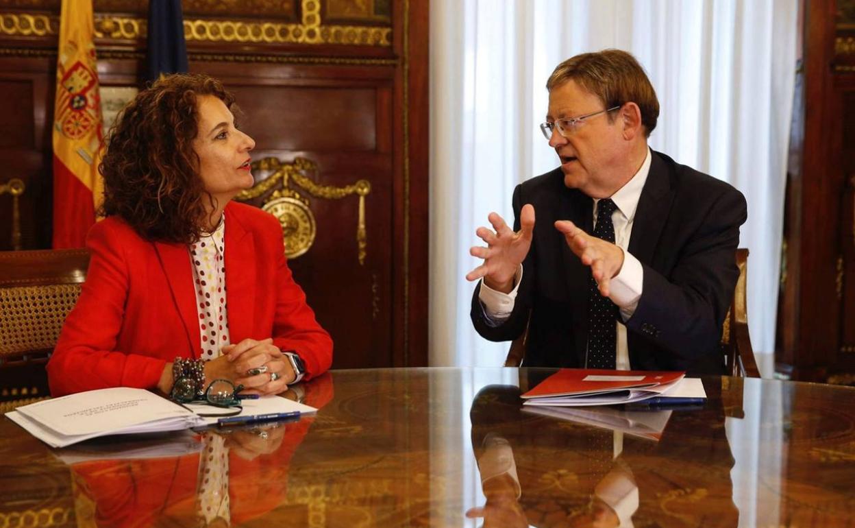 La ministra Montero y el presidente Puig. 