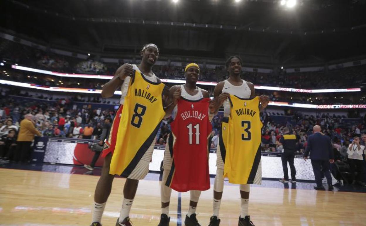 Jrue, Aaron y Justin Holiday 