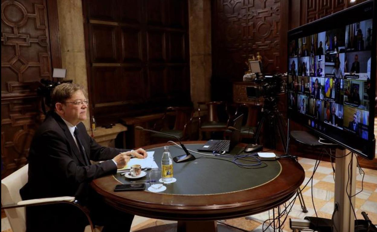 Puig, en la videoconferencia con el presidente del Gobierno. 