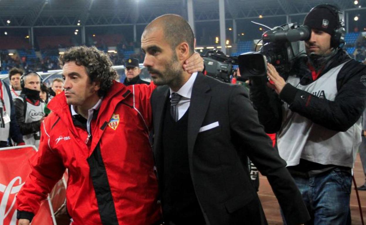 Juan Manuel Lillo y Pep Guardiola, en una imagen de 2010. 