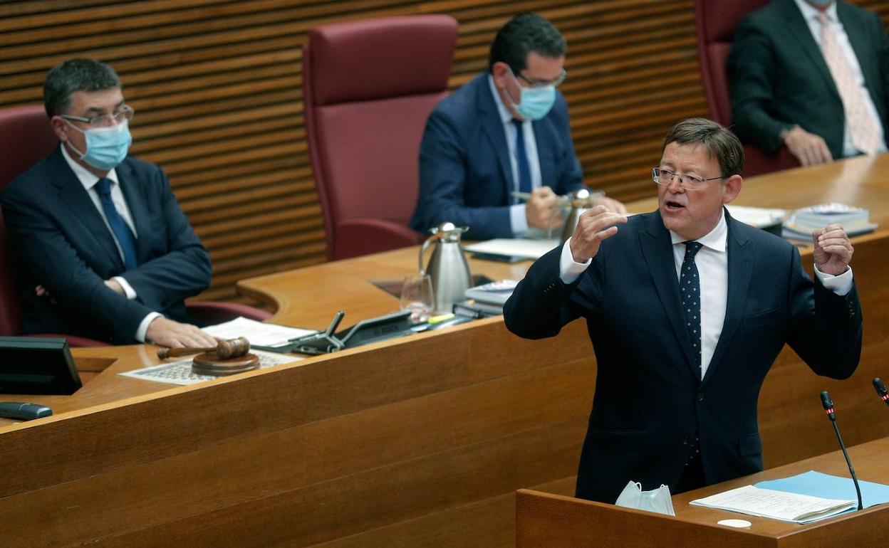 El presidente de la Generalitat, Ximo Puig, durante el debate sobre el estado de la Comunitat donde anunció la nueva paga extra para el personal sanitario. 