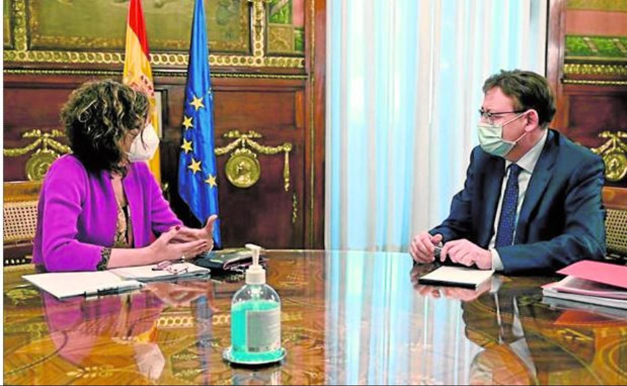 La ministra María Jesús Montero y el presidente Ximo Puig, en Madrid. 