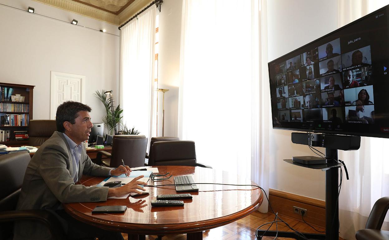 El presidente de la Diputación de Alicante, Carlos Mazón, durante la reunión telemática de este viernes. 