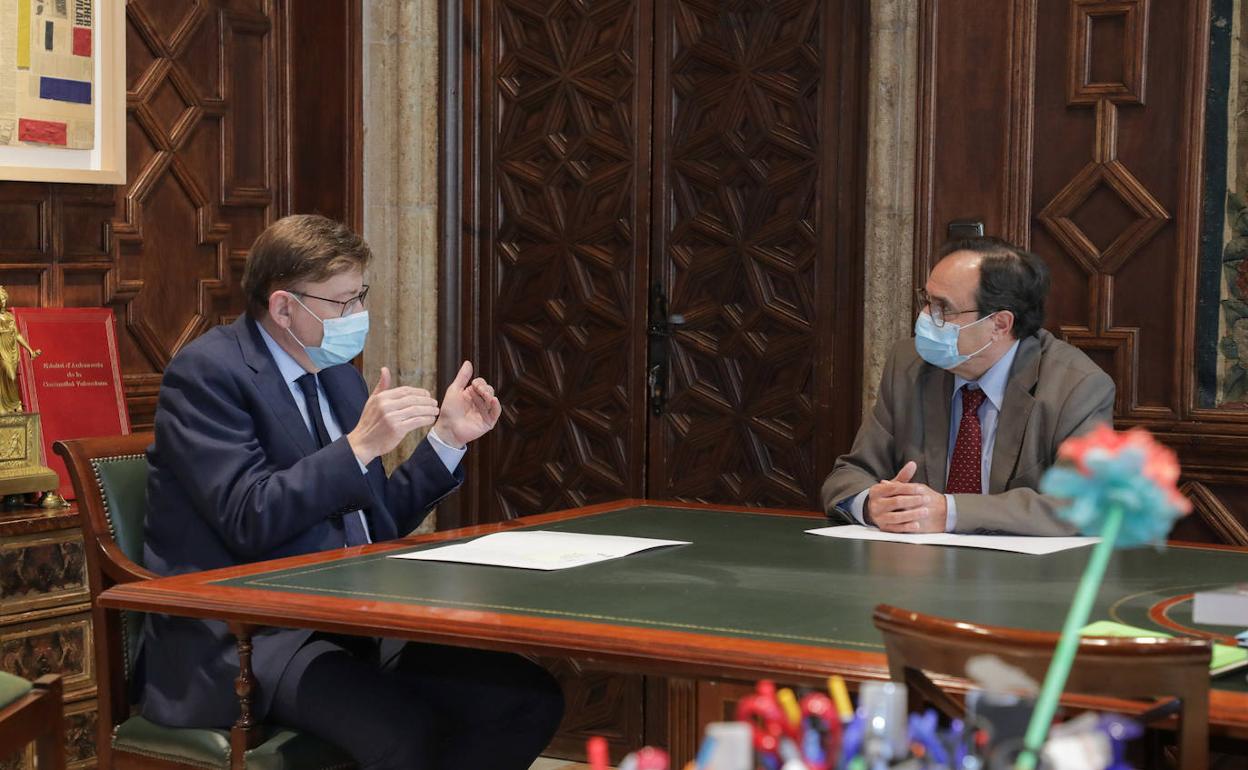 El presidente de la Generalitat junto al responsable de Hacienda 