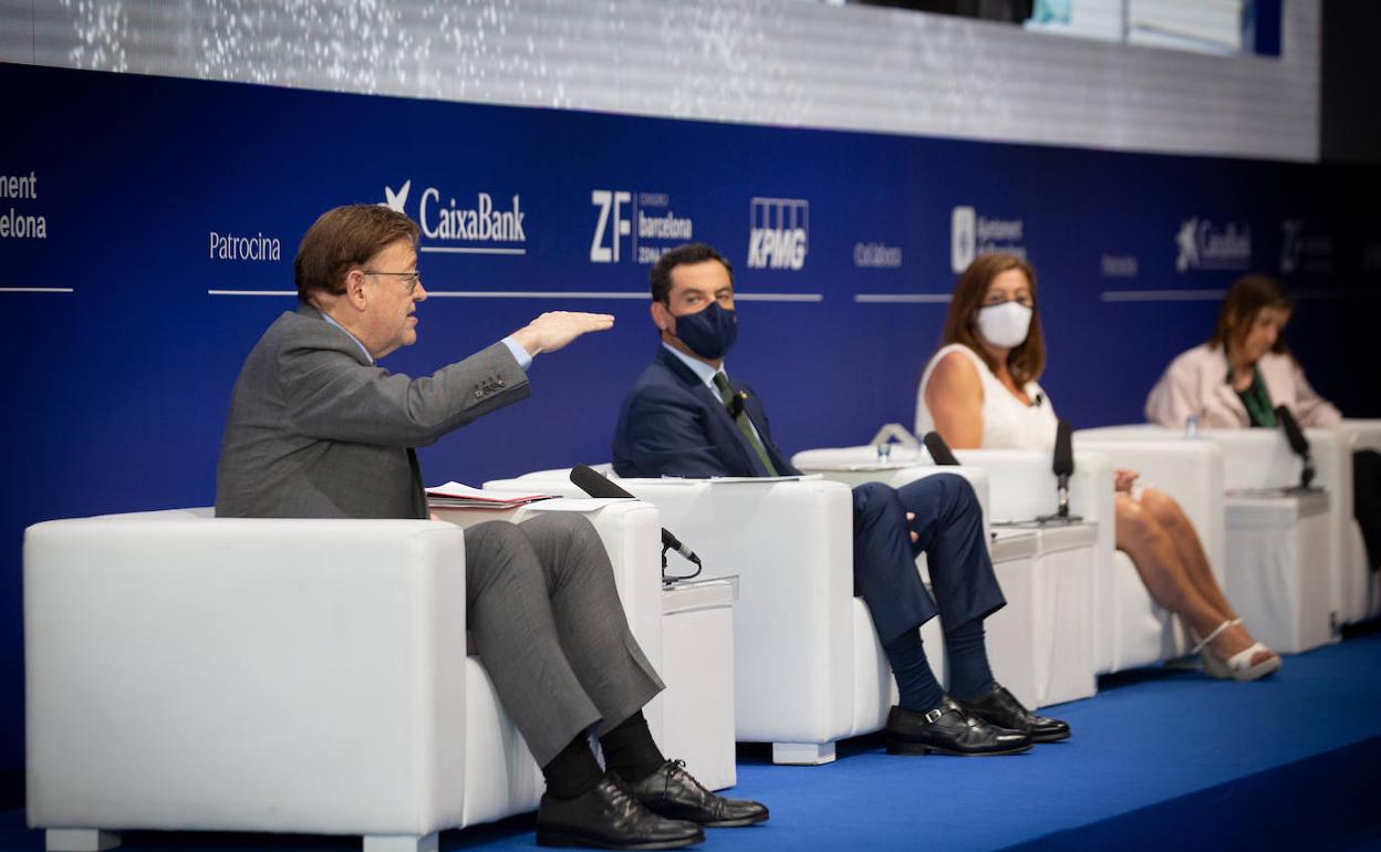 Los presidentes Puig, Moreno Bonilla y Armengol, en una charla en Barcelona, hoy