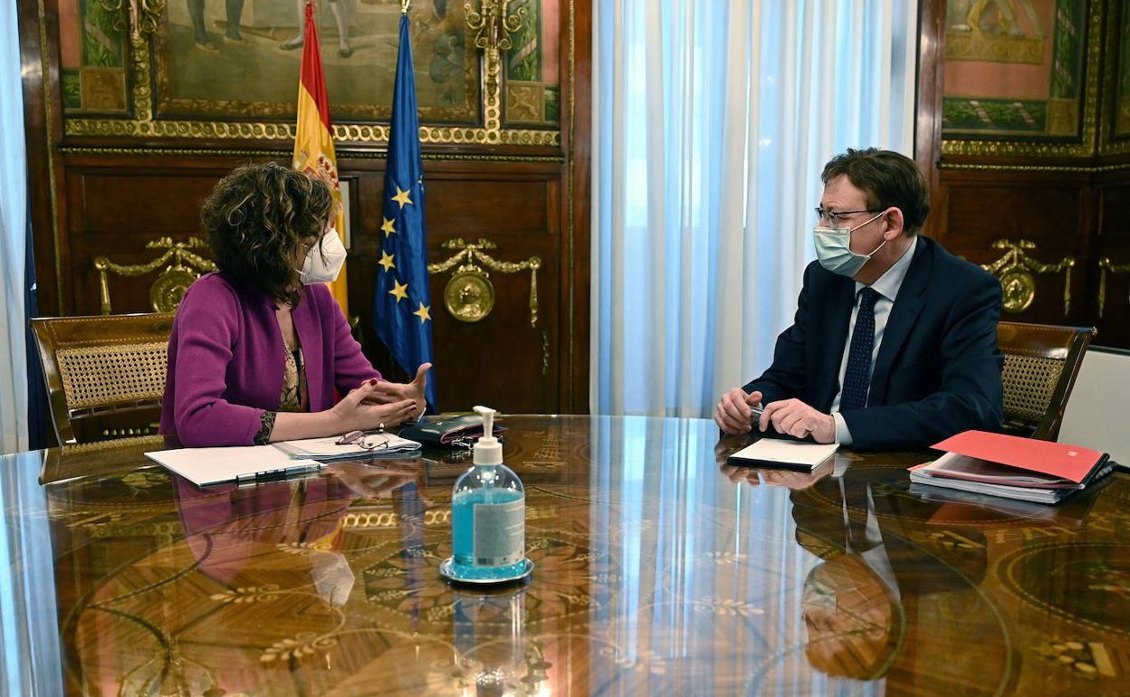 La ministra Montero y el presidente Puig, en una reunión el pasado mes de marzo. 