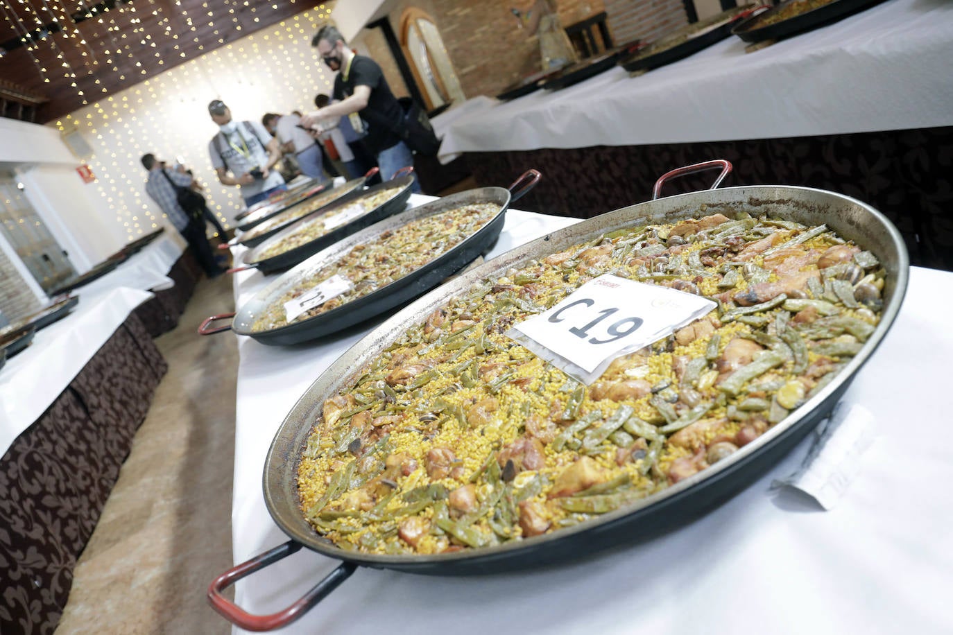 La localidad celebra una nueva edición del concurso internacional del plato tradicional valenciano